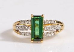 A 18 carat gold santa rosa tourmaline and diamond ring, the head set with a claw mounted baguette