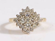 A 18 carat gold and diamond ring, the head set with twenty-one diamonds, ring size K weight 4.7