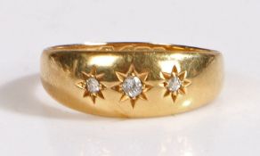 An 18 carat gold and diamond gypsy ring, the head set with three diamonds, weight 2.6 grams, rig