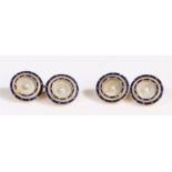 A pair of 18 carat gold and mother-of-pearl cufflinks, the round mother of pearl plaques each