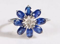 A 9 carat white gold AAA ceylon sapphire and diamond ring, the head in the form of a flower set with
