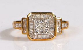 A 18 carat gold and diamond ring, the head set with nine brilliant diamonds surrounded by baguette