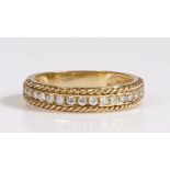9 carat gold and diamond half-hoop eternity ring, having an elegant line of  diamonds set within