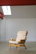 A Danish formed laminate & wool lounge chair