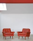 A pair of Danish leather lounge chairs, by Svend Skipper, 70cm high, 75cm wide (2)