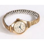 Record 9 carat gold ladies wristwatch,  the dial with Arabic numerals and outer minutes track, the