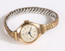 Record 9 carat gold ladies wristwatch,  the dial with Arabic numerals and outer minutes track, the