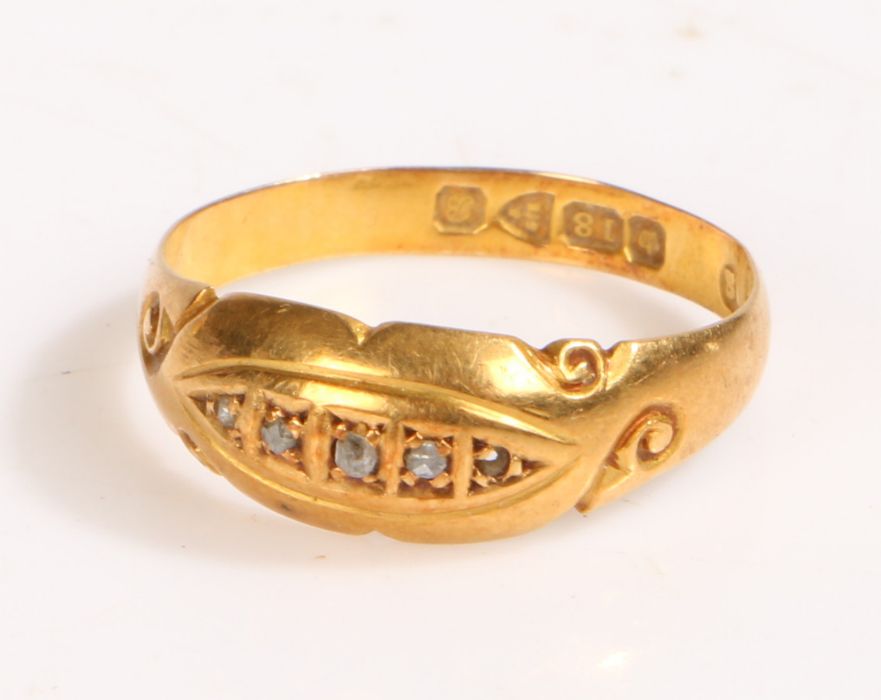18 carat gold and diamond ring, the head set with four diamonds, ring size L weight 1.8 grams