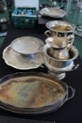 Silver plated ware to include two oval trays with pierced borders, two campagna form wine coolers,