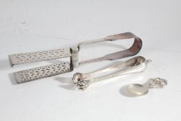 Pair of French silver sugar tongs, pair of Harwood silver plated asparagus tongs, Scottish silver