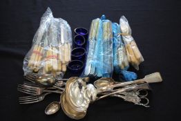 Silver plated cutlery and flatware, to include ladles, grape scissors, nut crackers, sugar tongs,