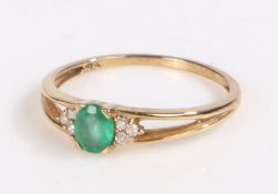 9 carat gold diamond and green stone ring, the head set with a oval green stone together with