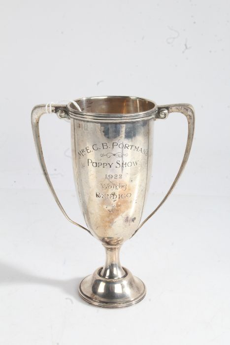 George V silver trophy cup, London 1919, maker Asprey & Co Ltd. wit h angular handles, the body