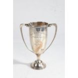 George V silver trophy cup, London 1919, maker Asprey & Co Ltd. wit h angular handles, the body