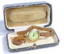 Early to mid 20th century rolled gold cased wrist watch, weight 27.6 grams