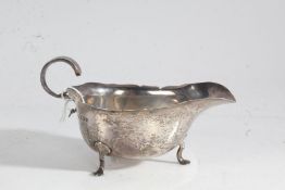 Edward VII silver sauceboat, Birmingham 1909, maker Horace Woodward & Co Ltd. with double scroll