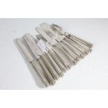 Set of six silver handled table knives, matching set of six silver handled dessert forks, marks