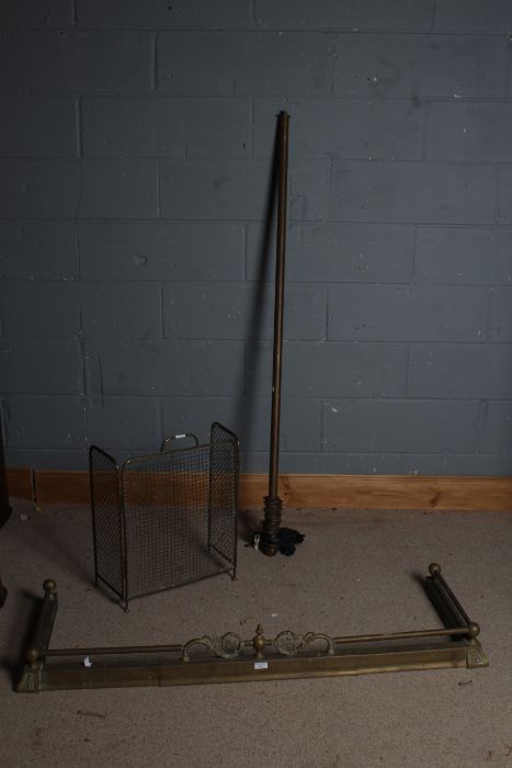 Large brass extendable fire fender together with a folding brass fire guard and a curtain pole (3)