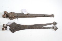 Two pairs of iron door hinges, 49.5cm and 53.5cm wide (4)