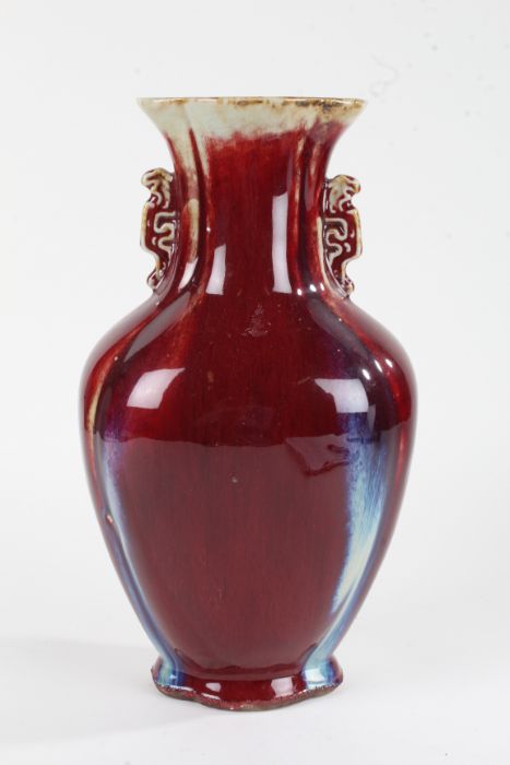 Chinese Sang De Boeuf vase, 20th century, with flared neck and ovoid body, with handle either