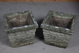 Pair of concrete stone effect garden pots of square form, the body with a stone brick effect, 43cm