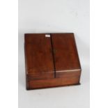 Victorian mahogany stationary box, baring the label W. H. Travers, the sloping front with a pair