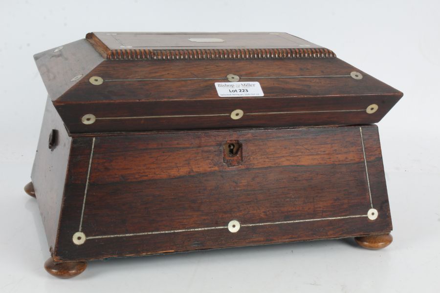 Victorian rosewood and mother of pearl inlaid jewellery box, the hinged top above an angled base