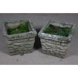 Pair of concrete stone effect garden pots of square form, the body with a stone brick effect, 43cm