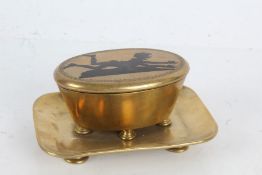 Unusual 19th Century gilt brass table vesta, the oval vesta with hinged lid inlaid in black enamel