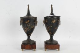 Pair of 19th Century style toleware urns and covers, with gilt insect, and butterfly decoration, the