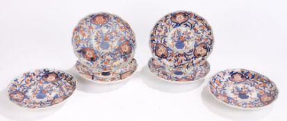 Matched set of six Japanese Imari 19th Century dishes, with a foliate urn to the centre of each