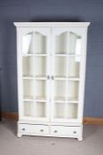 20th century white painted pine cabinet, having a pair of glazed doors enclosing shelves, fitted two