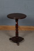 19th century mahogany circular occasional table, the circular top above a turned column above a