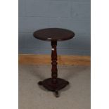 19th century mahogany circular occasional table, the circular top above a turned column above a