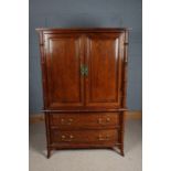 Chinese style faux bamboo cabinet, by Furniture of Distinction, the pair of doors enclosing a pigeon