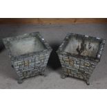 Pair of concrete stone effect garden pots of tapering square form, the tapering square body in the