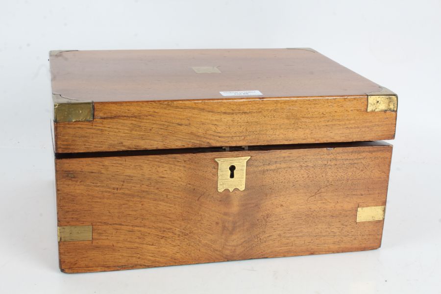 Victorian mahogany and brass bound writing box, the hinged lid enclosing a brown leather inset