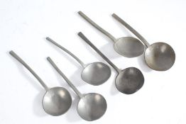 Six 17th century style pewter spoons, with plain stems and bowls, touch marks to bowl (6)