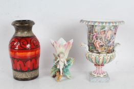 KPM porcelain vase, mounted with putti, stamped to base, 14cm high, together with a West German