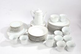 Solitaire porcelain ten piece dinner service, with gilt bands on a white ground (qty)