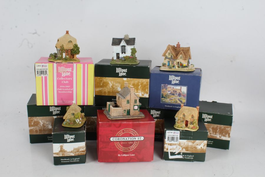 Collection of Lilliput Lane, to include 'Swiss Cottage, Gate Keeper's Lodge, Say it with Flowers,