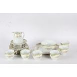 Noritake porcelain tea set, comprising six cups, five saucers, six side plates, two serving