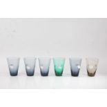 Set of six glass beakers, the tapering bodies with white leaf prunt decoration, 12cm high (6)