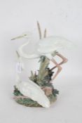 Lladro porcelain heron figure group, modelled as two heron within reeds, 34cm tall