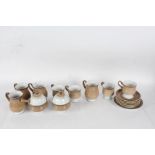 Quantity of Denby mugs and saucers, and two lidded preserve pots (qty)