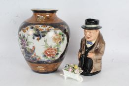 Royal Doulton 'Winston Churchill' toby jug, 23cm tall, together with a Chinese style vase, with