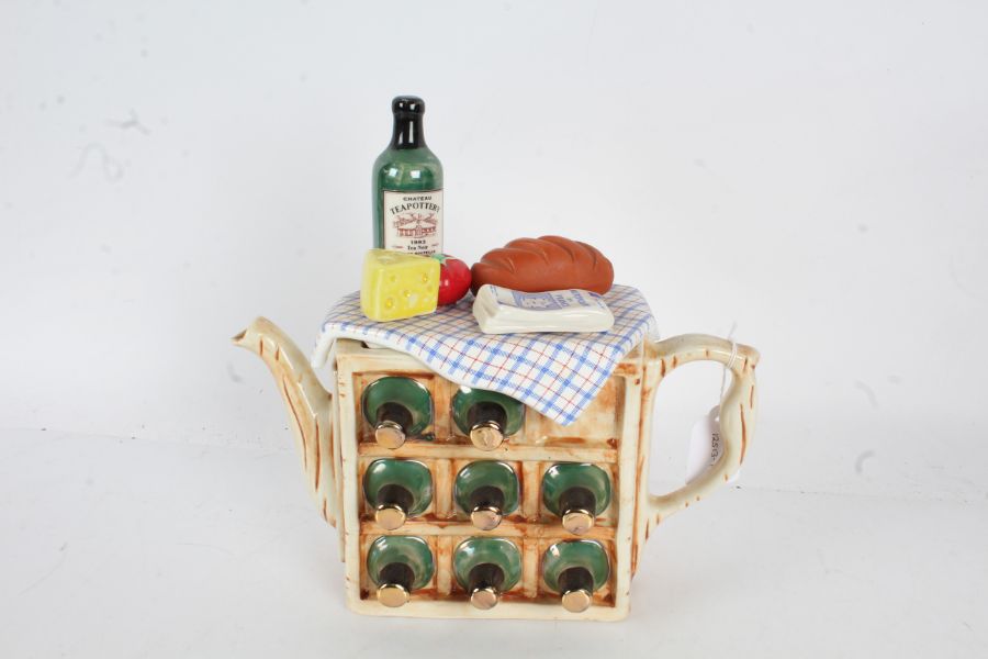 Novelty teapot by The Teapottery Company, in the form of a wine rack 26cm wide