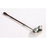 George II silver toddy ladle, London 1754, makers mark rubbed, the oval bowl tapering to a spout,