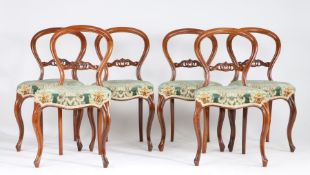 Set of six Victorian rosewood balloon back dining chairs, with pierced acanthus leaf carved