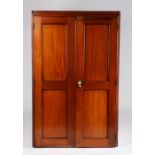 Victorian mahogany plan chest, the two panelled cupboard doors opening to reveal twelve interior